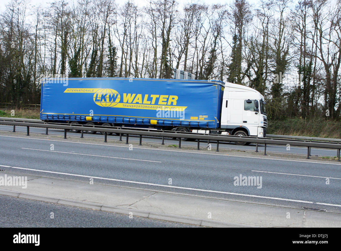 A truck traveling along the A12 in Essex, England Stock Photo