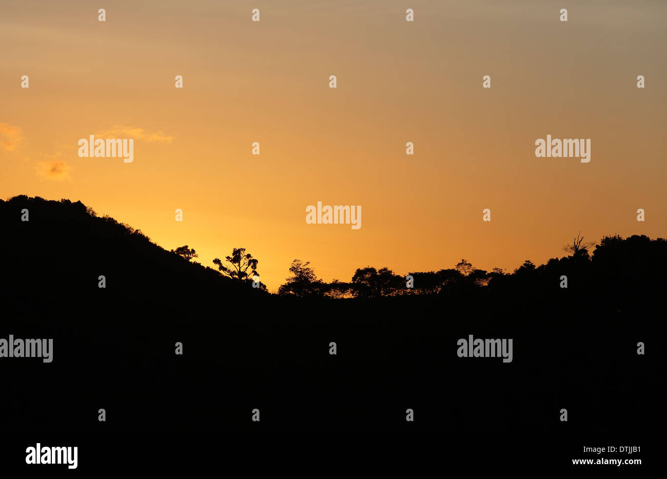 Sunset on forested mountain ridge, San Ramon, Nicaragua Stock Photo
