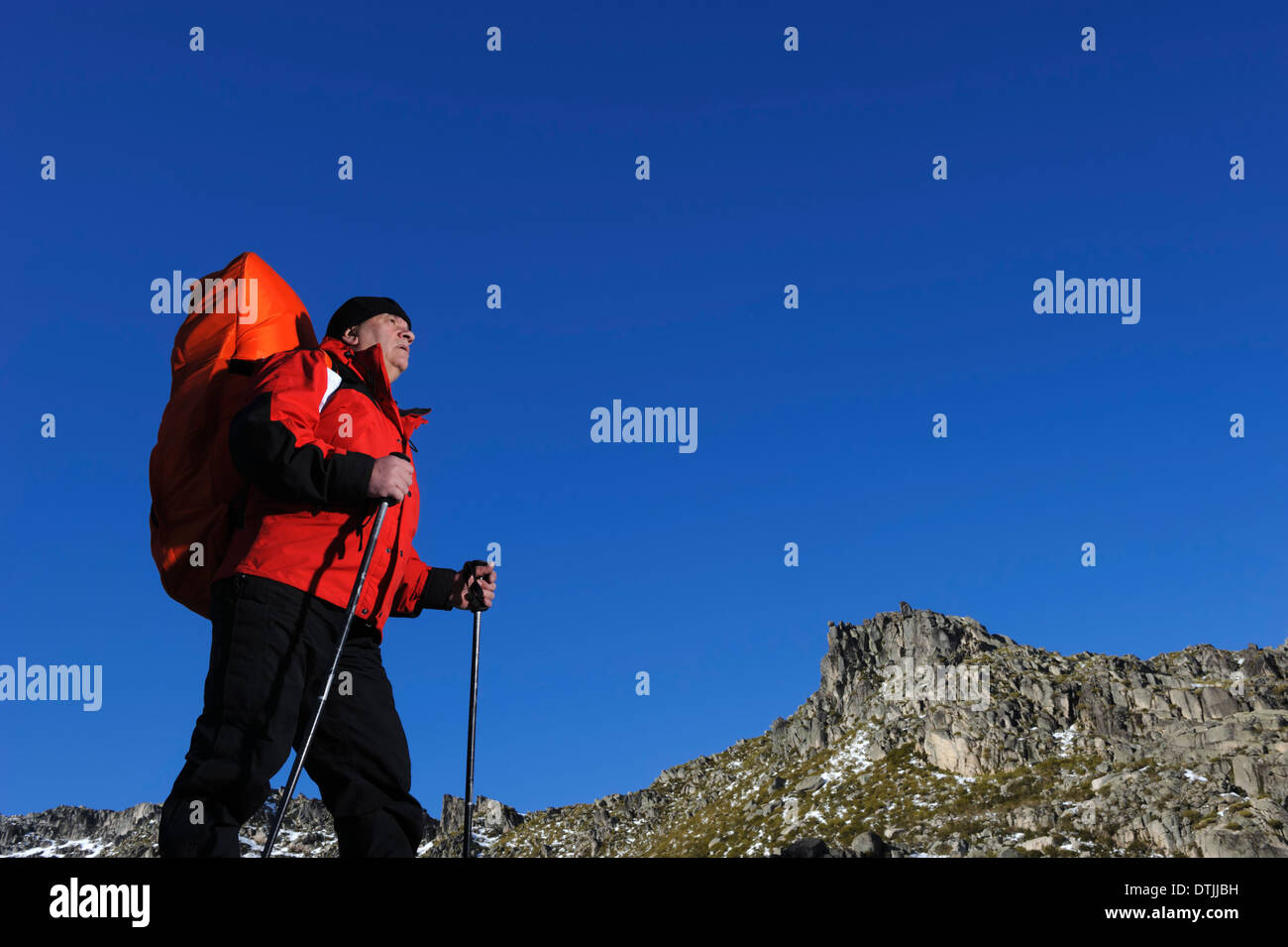 Middle aged man hiking in the Winter Stock Photo