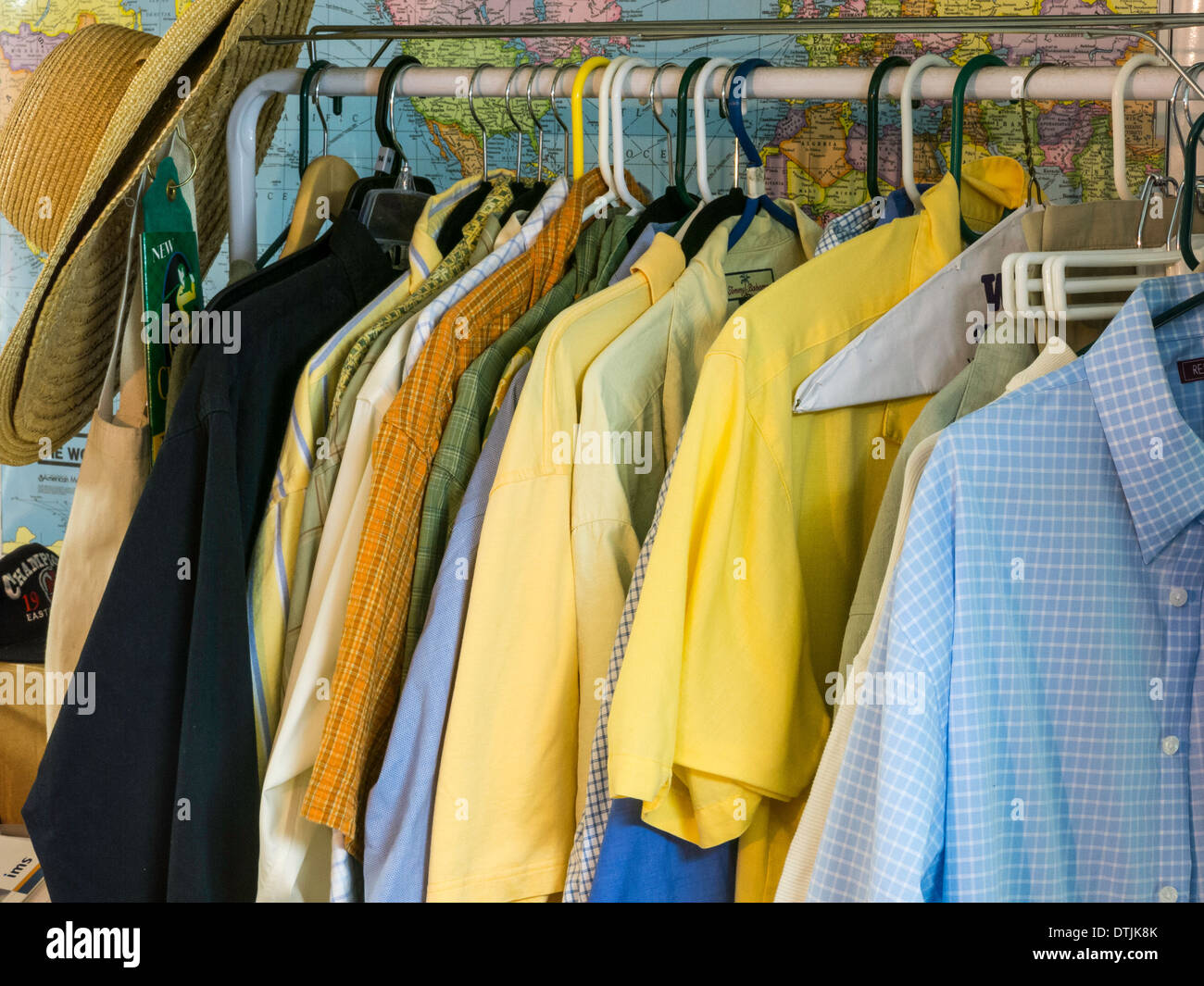 Clean Clothes Hanging in a Residential Laundry Room Stock Photo