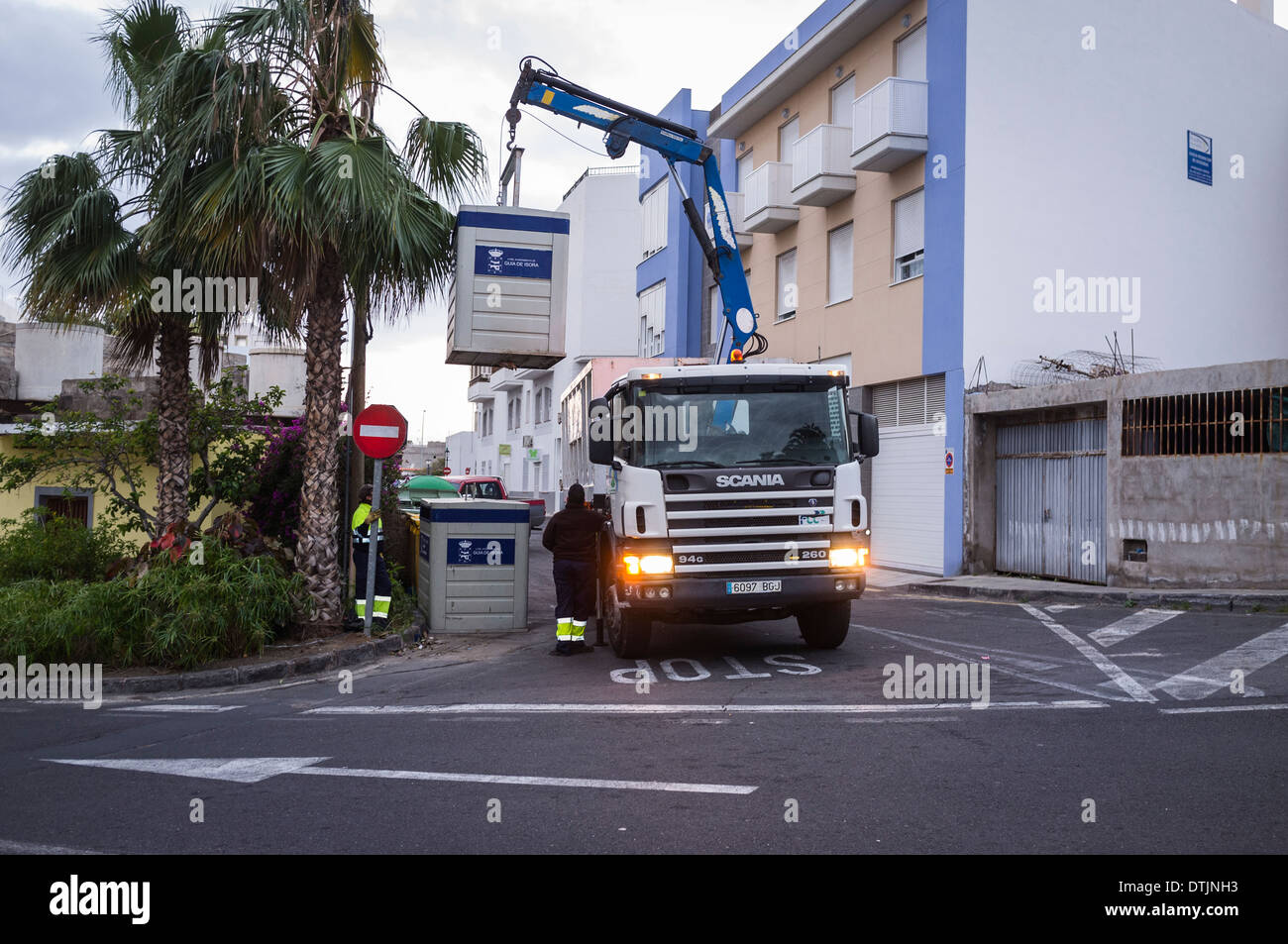 Guia de Isora council rubbish truck collecting paper recycling container from a street in Playa San juan, Tenerife, Stock Photo