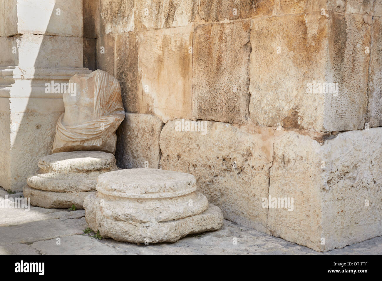 Roman statue and ancient wall background in theater Stock Photo