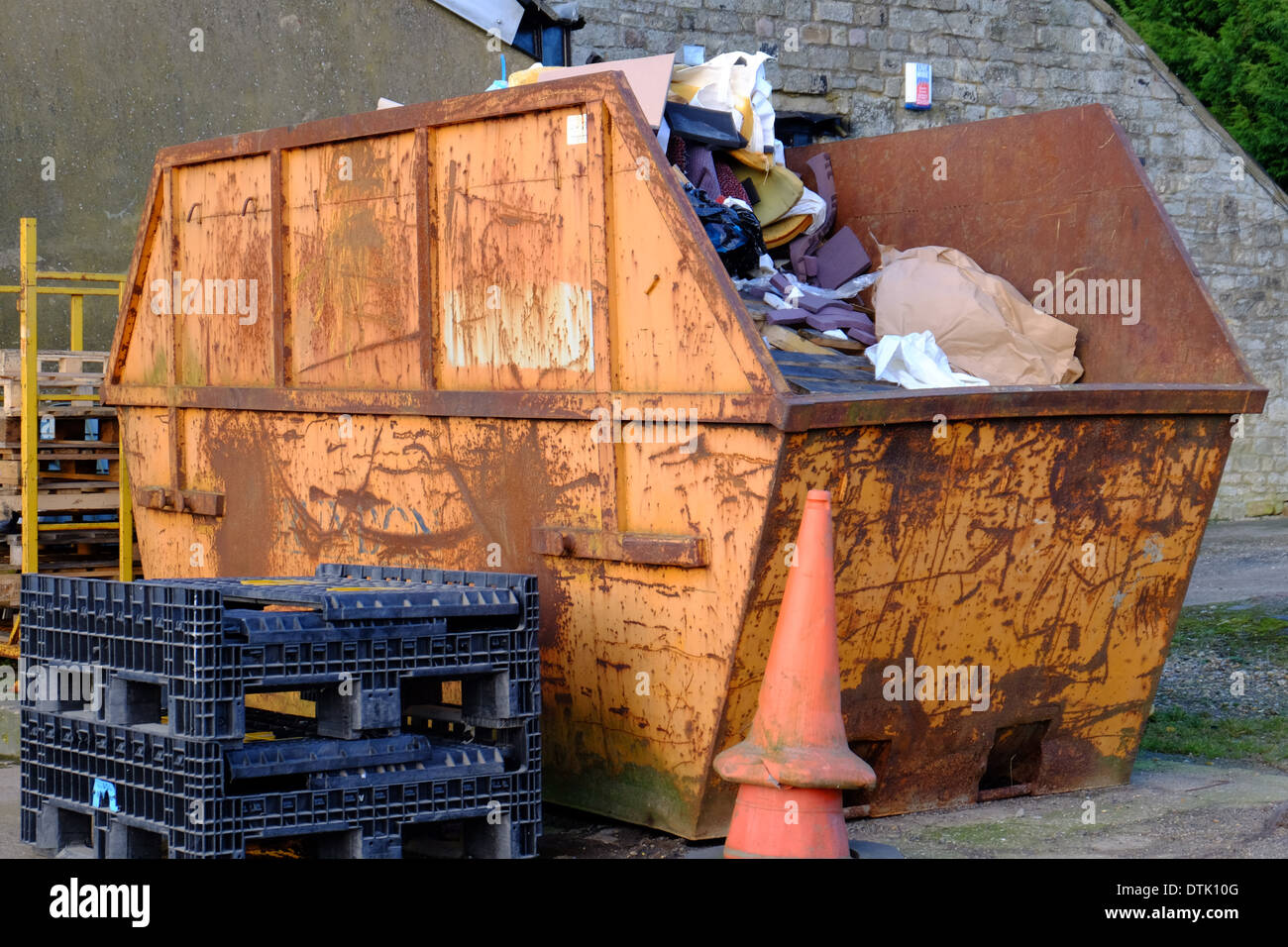 A skip on an industrial estate Stock Photo