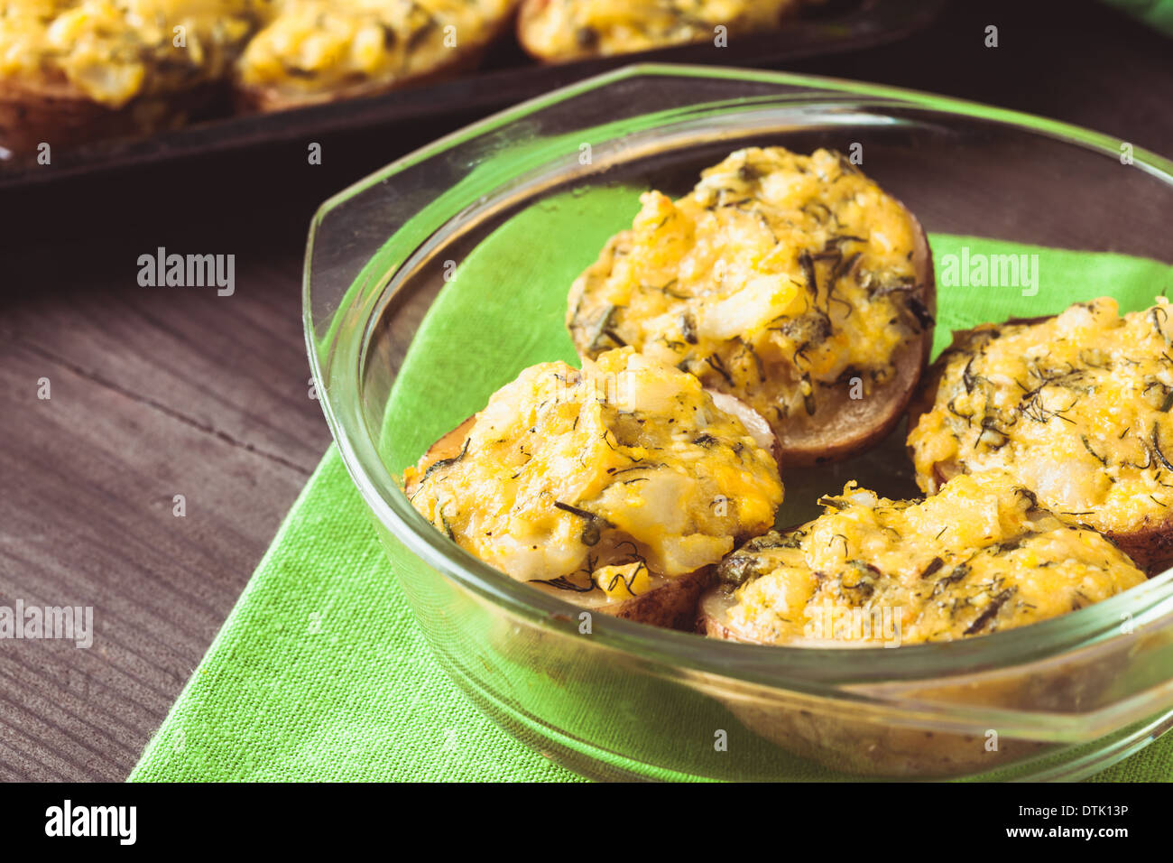 Stuffed baked potato with eggs, cheese and spices Stock Photo Alamy