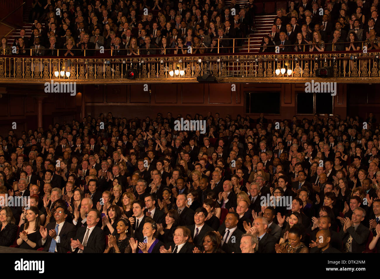 Audience applauding in theater Stock Photo