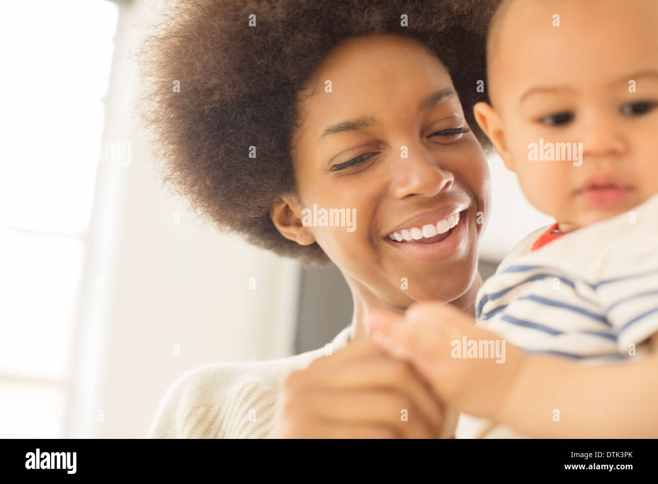 Mother holding baby boy Stock Photo