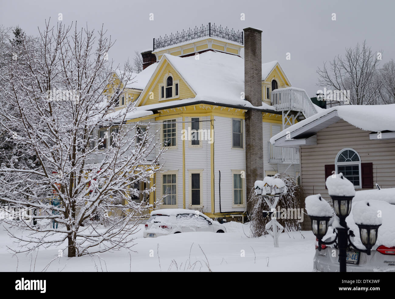 Snow covered heritage home in small town Marmora Ontario Stock Photo