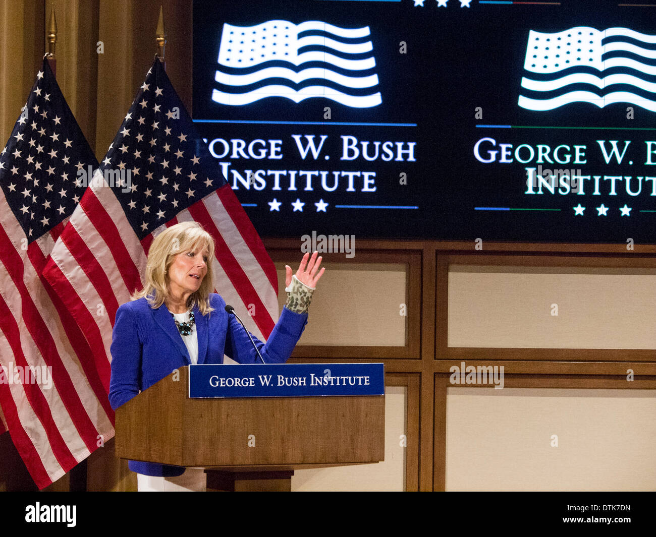 Dallas, TX, USA . 19th Feb, 2014.  Jill Biden, wife of Vice President Joe Biden, jokes about being a 'wounded warrior' holding up the cast on her broken wrist, in OD camouflage. She and the First Lady, Micheal Obama formed Joining Forces to help military veteran's get back to civilian life. Credit:  J. G. Domke/Alamy Live News Stock Photo