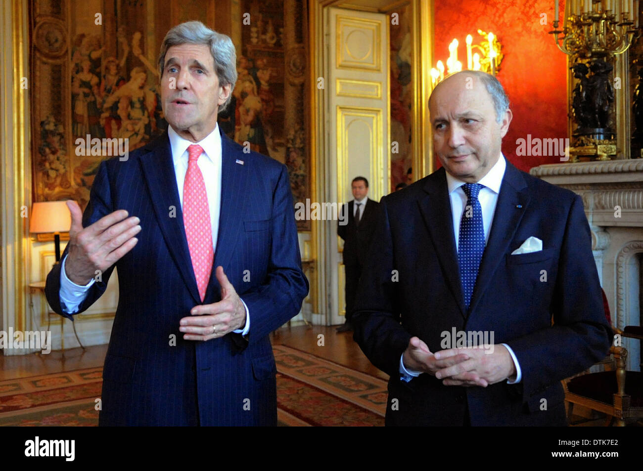 US Secretary of State John Kerry joined by French Foreign Minister Laurent Fabius, speaks to reporters about the situation in Ukraine before a bilateral meeting at the Quai d'Orsay February 19, 2014 in Paris, France. Stock Photo
