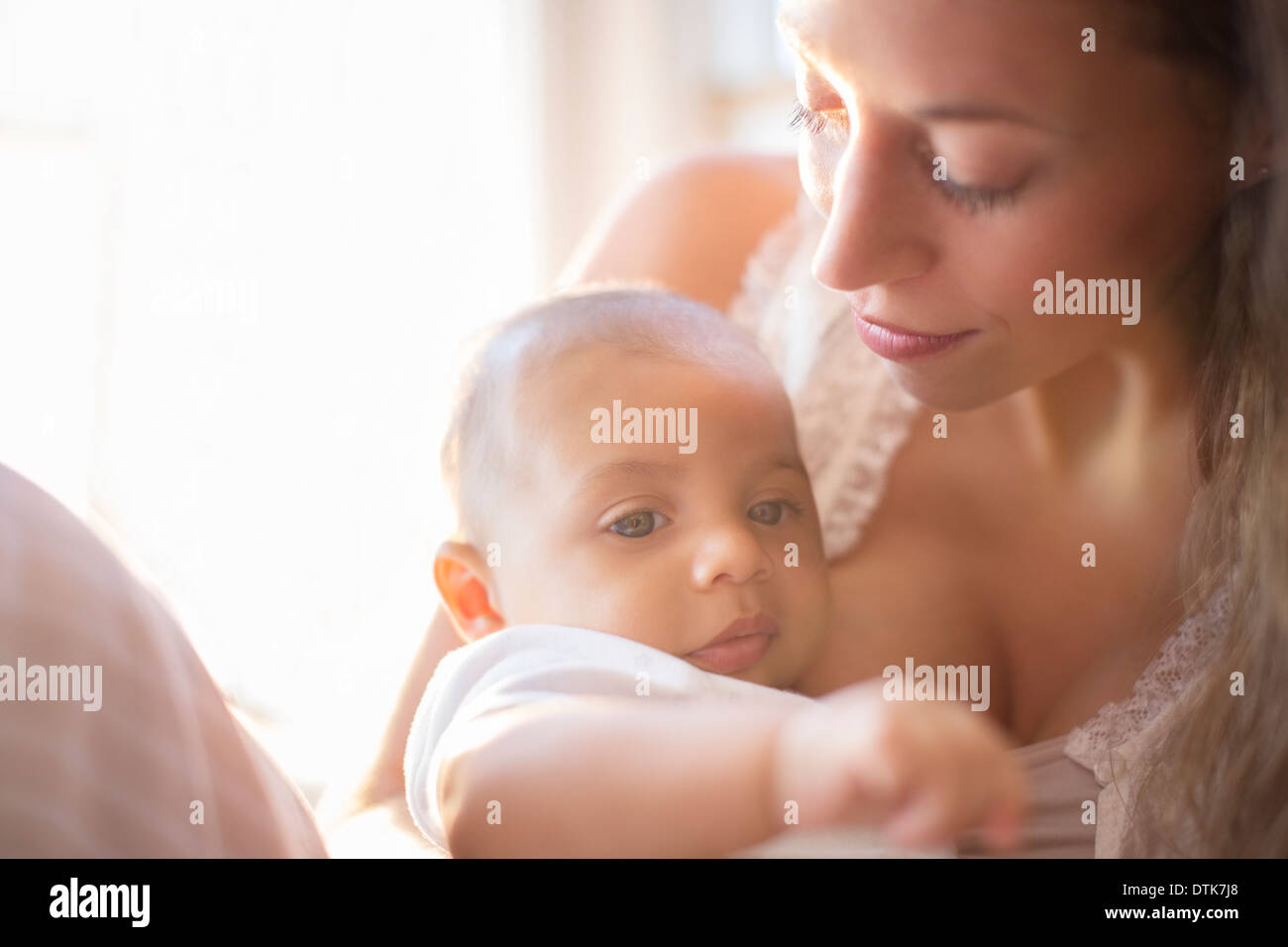 Mother holding baby boy Stock Photo