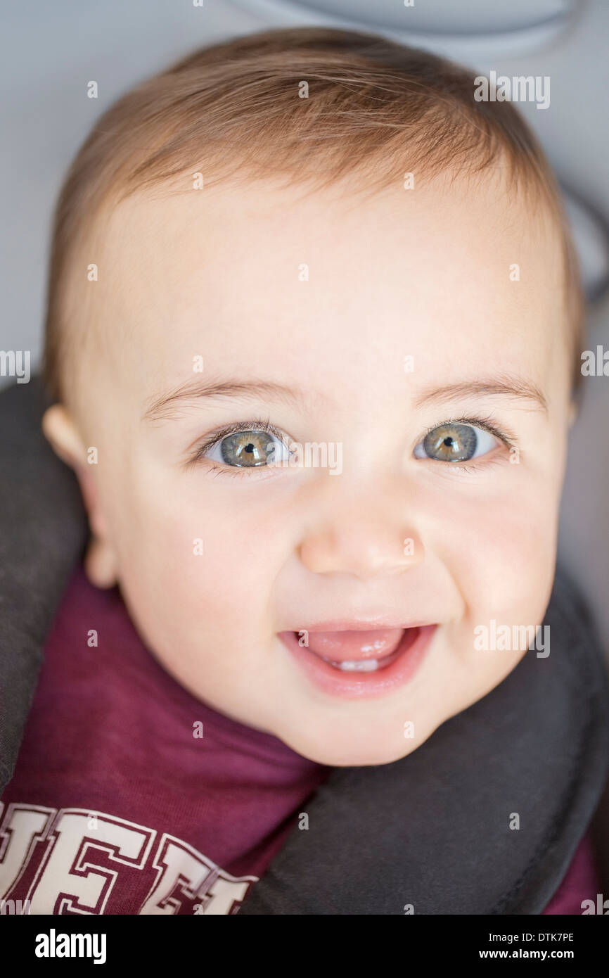 Close up of baby boy's smiling face Stock Photo