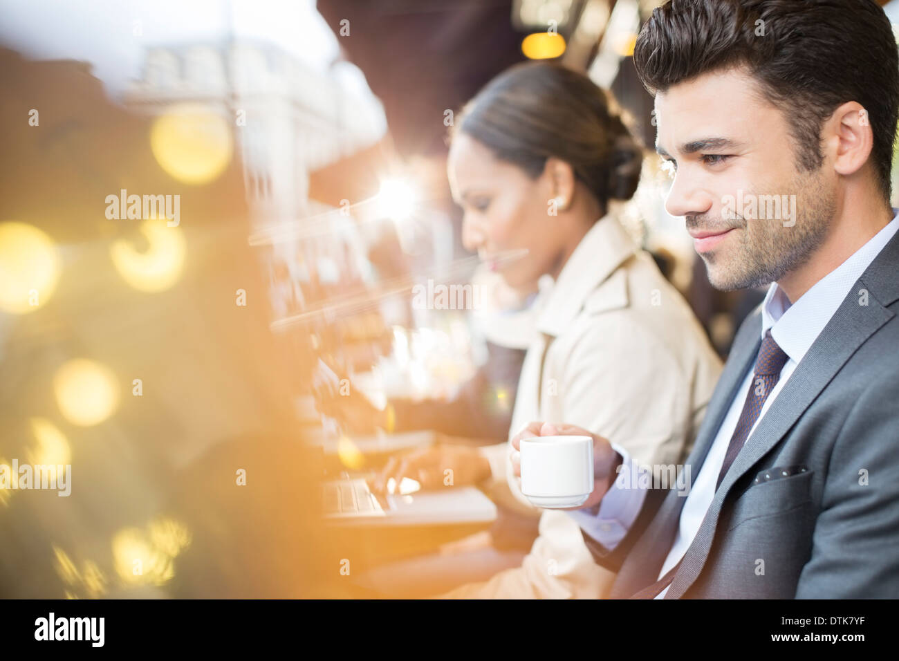 Business people working at sidewalk cafe Stock Photo