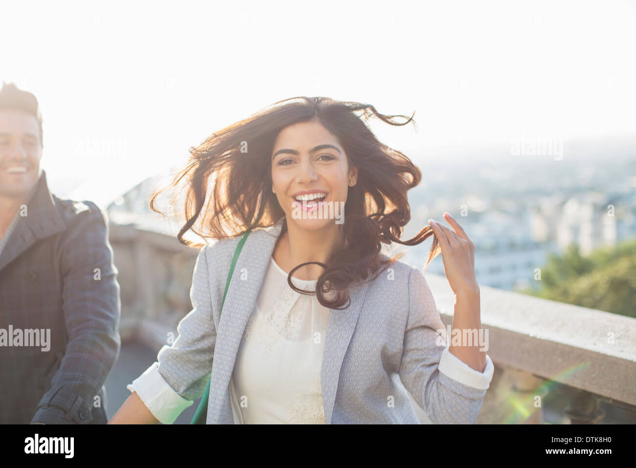 Couple running outdoors Stock Photo