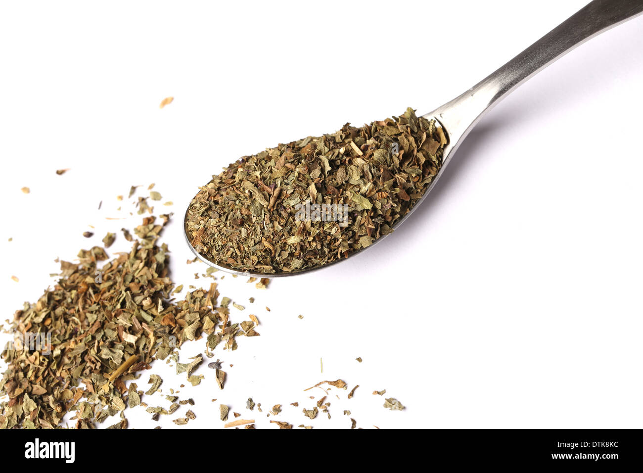 Whole sweet basil on spoon Stock Photo