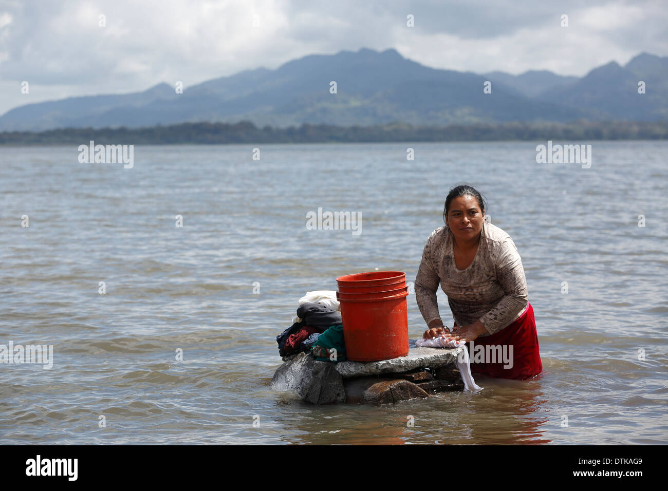 Woman hand washing laundry, Lago de Apanas, Nicaragua Stock Photo