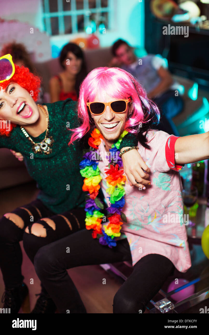 Couple wearing costumes at party Stock Photo