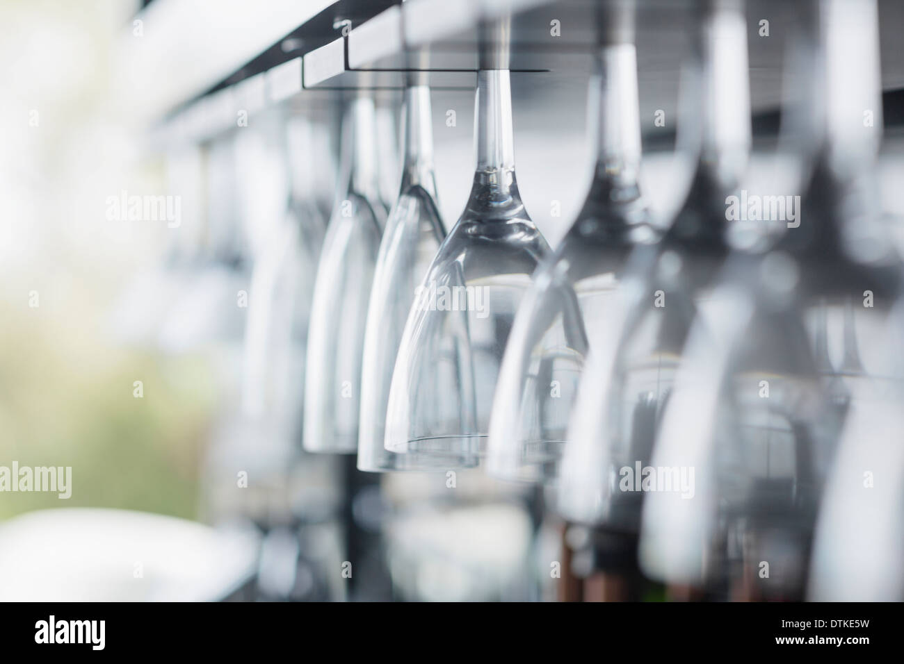 Close up of wine glasses in bar Stock Photo