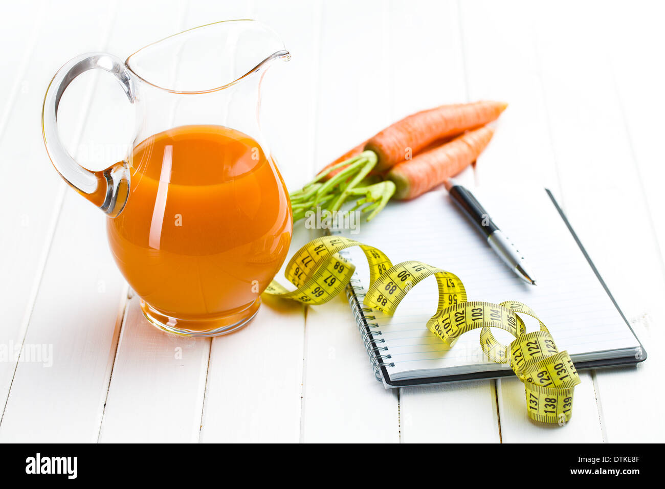 dieting concept. carrot juice in pitcher Stock Photo