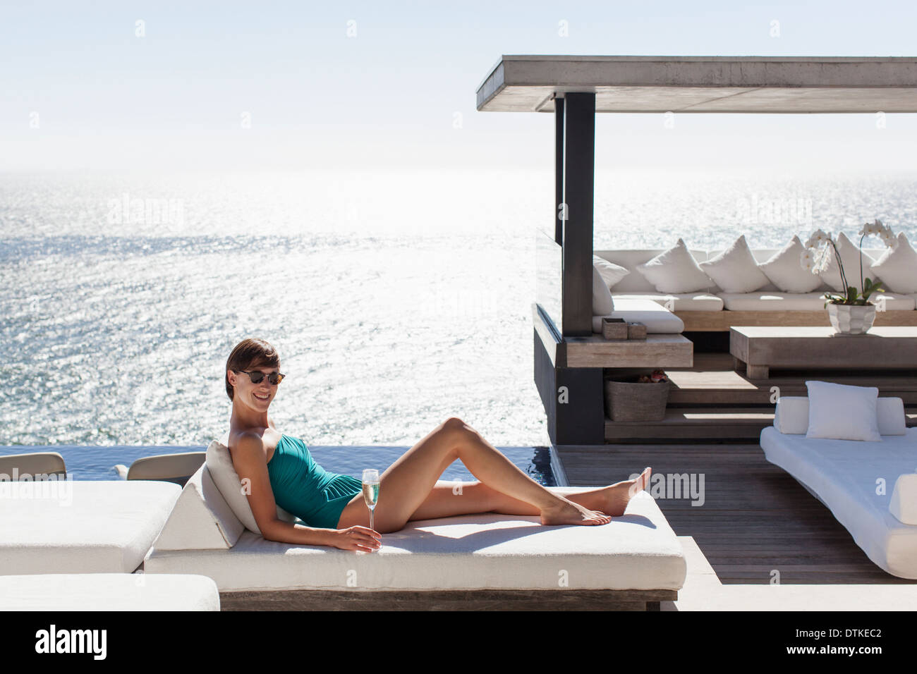 Barefoot woman resting feet on hi-res stock photography and images - Alamy