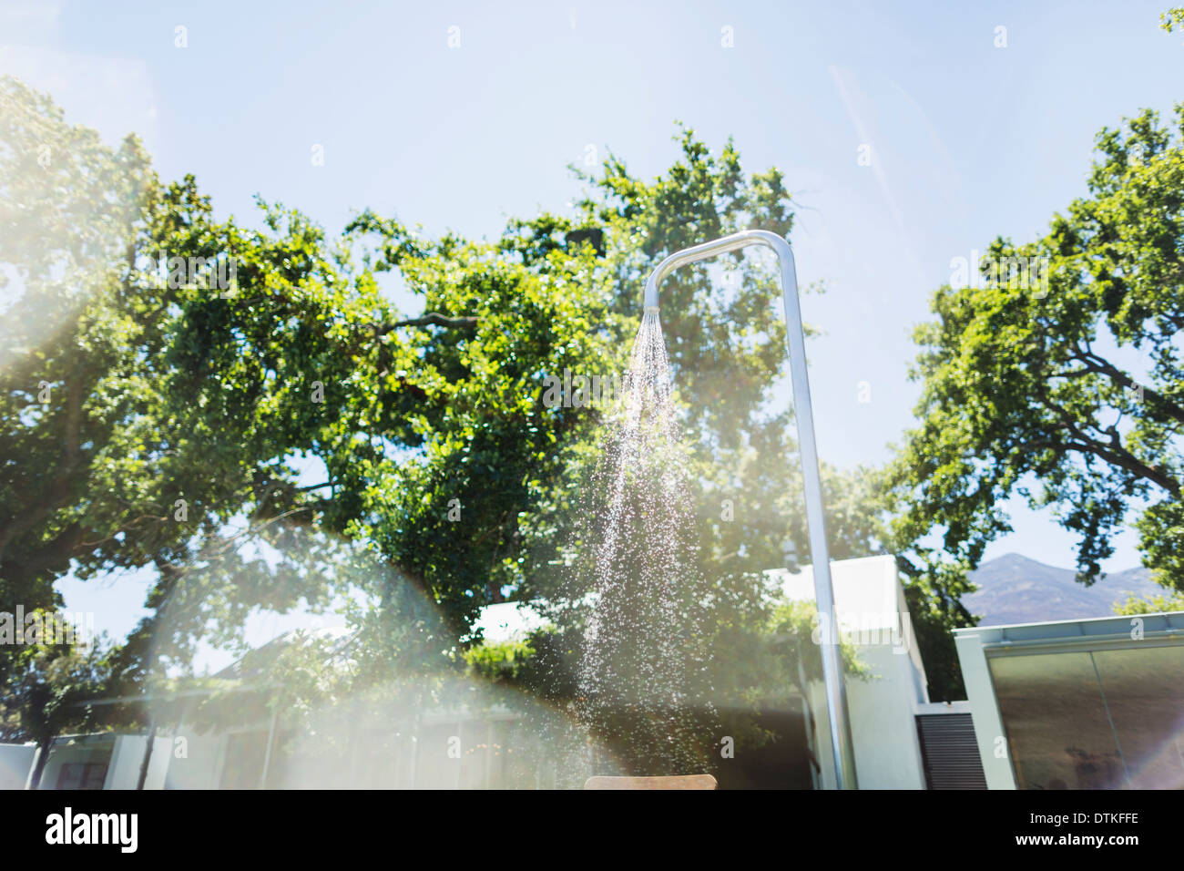 Running water from outdoor shower Stock Photo