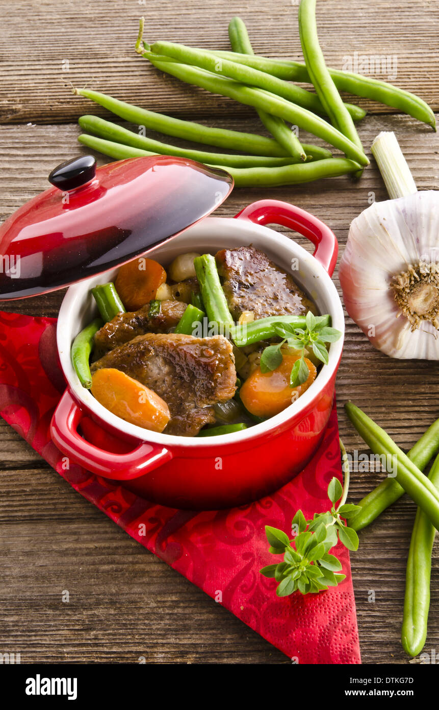 pork medallions in herbs Stock Photo