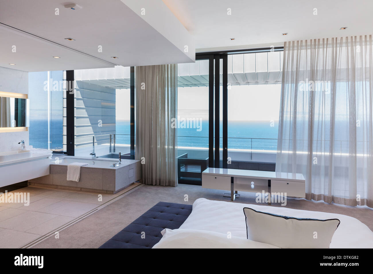 Modern bedroom overlooking ocean Stock Photo Alamy