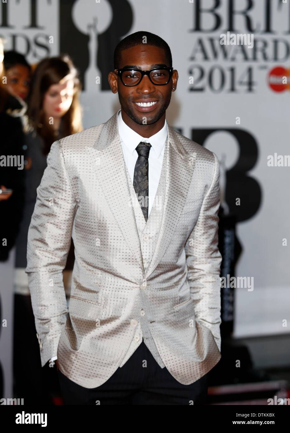 London, UK . 19th Feb, 2014. Tinie Tempah arrives at the BRIT Awards 2014 at O2 Arena in London, Great Britain, on 19 February 2014. Photo: Hubert B?sl Credit:  dpa picture alliance/Alamy Live News Stock Photo