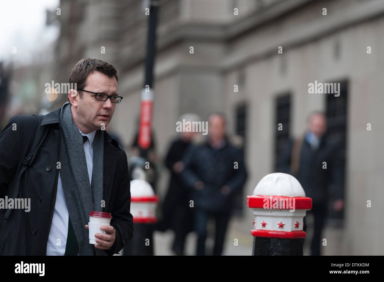 London, UK . 20th Feb, 2014. The phone-hacking trial continues at the Old Bailey in London with former News of the World executives entering their second day of their defence against allegations of illegally intercepting voicemail messages on mobile phones amongst other related charges. Pictured: Andy Coulson (left). Credit:  Lee Thomas/Alamy Live News Stock Photo