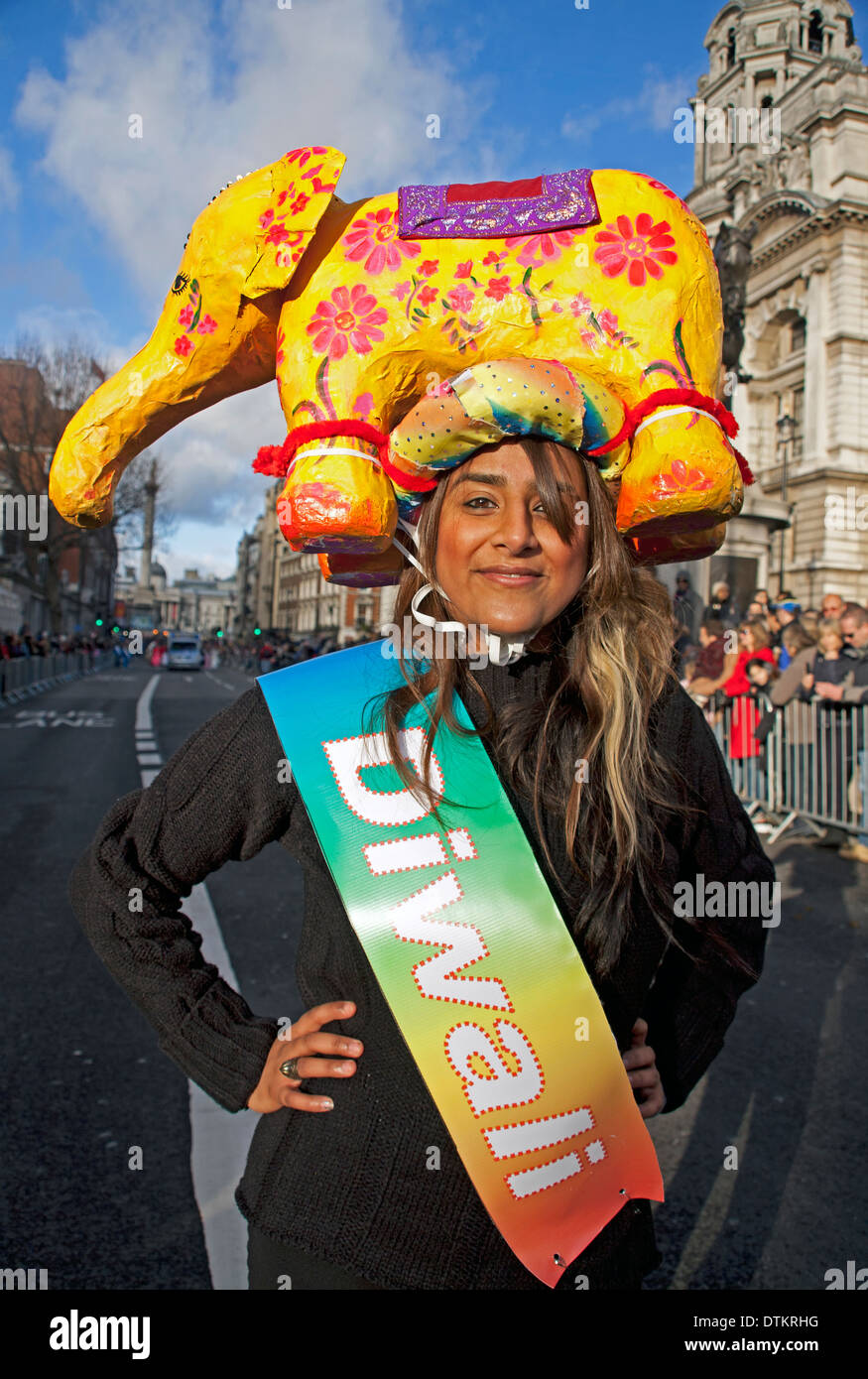 Female participant wearing a 'Diwali' sash at the 2013 New Year's Day Parade Stock Photo