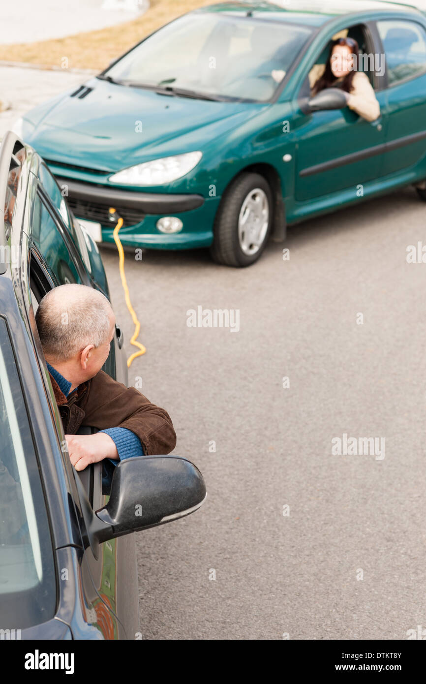 Man pulling car hi-res stock photography and images - Alamy