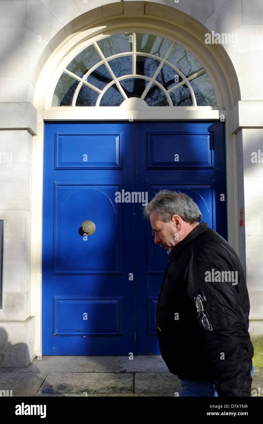 Man walking into door hi-res stock photography and images - Alamy