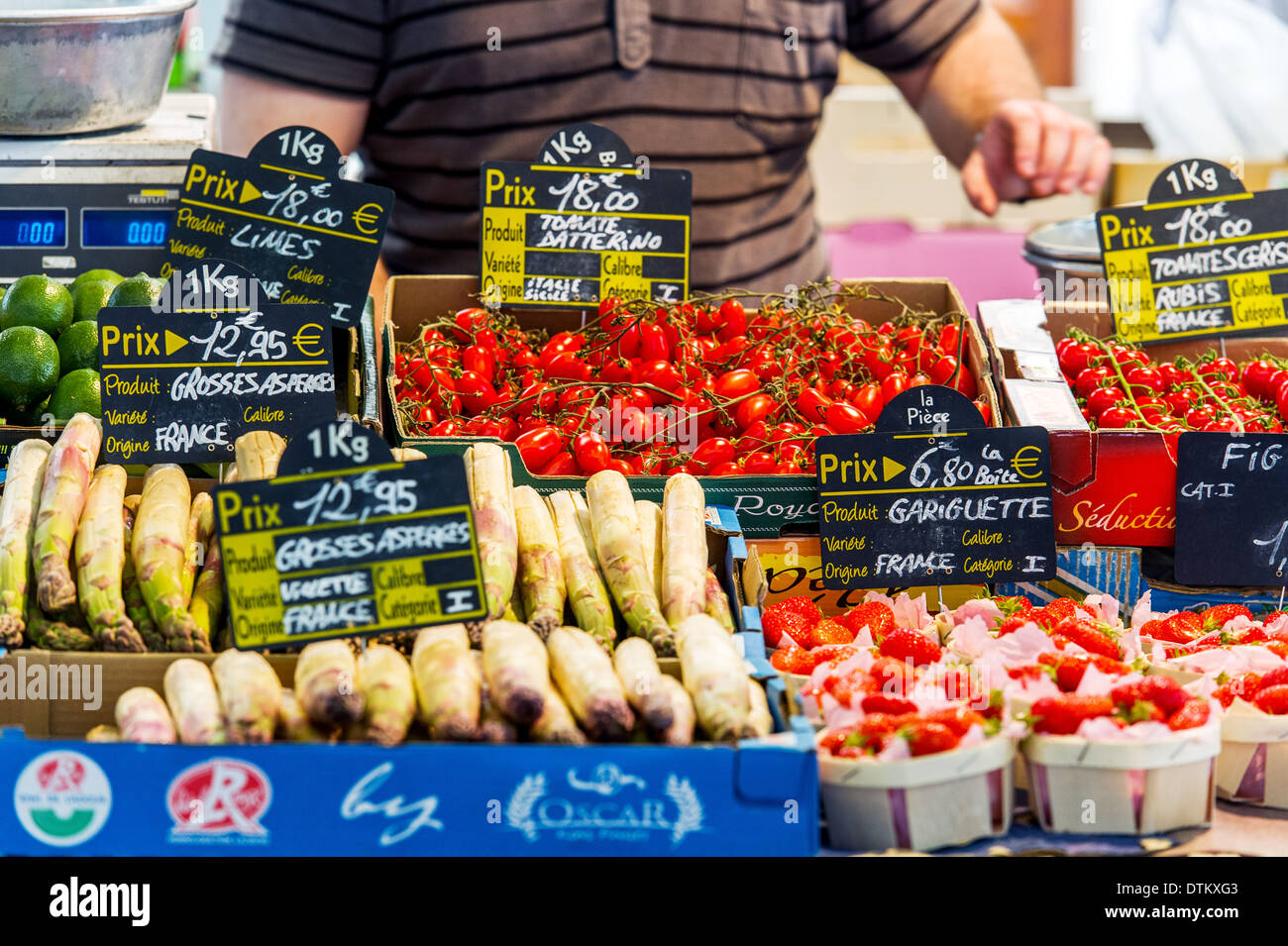 Europe, France, Alpes-Maritimes, Antibes. Provencal market. Strawberries Asparagus and tomatoes. Stock Photo