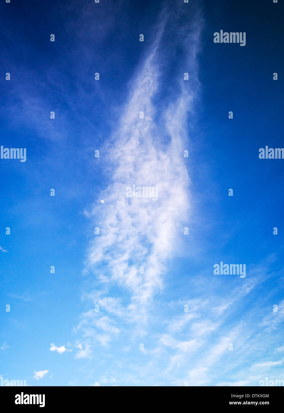 Wispy white clouds against an azure clear blue Colorado sky Stock Photo