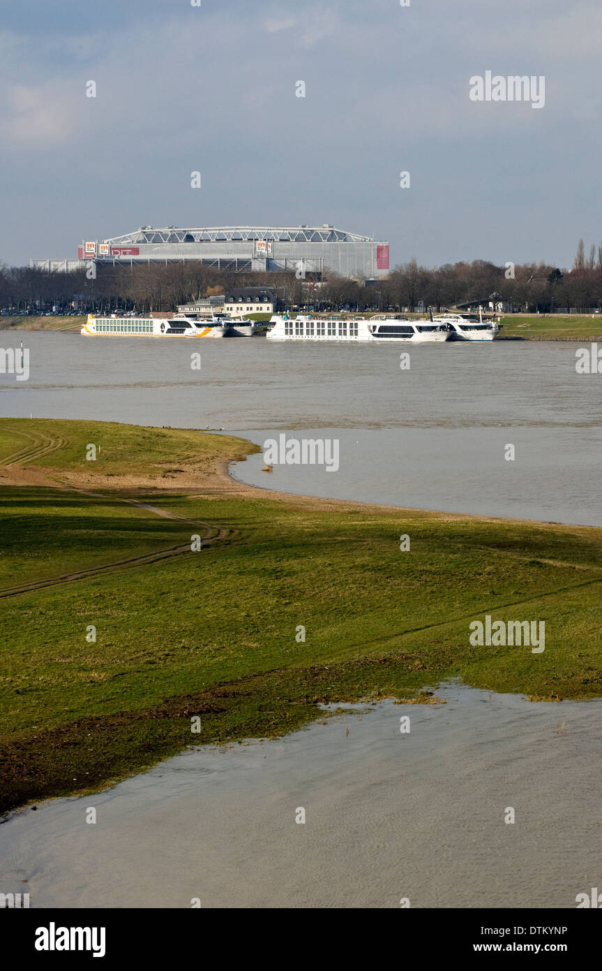 View over the Rhine Meadows to the Arena & Trade Fair Halls with Hotel  Boats, Düsseldorf, NRW, Germany Stock Photo