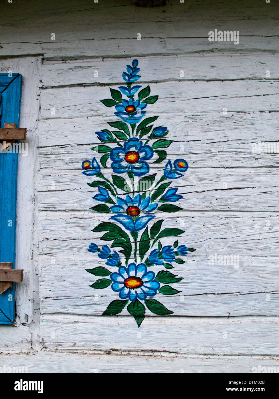 Painted decoration on an old house in the village Zalipie in Poland Stock Photo