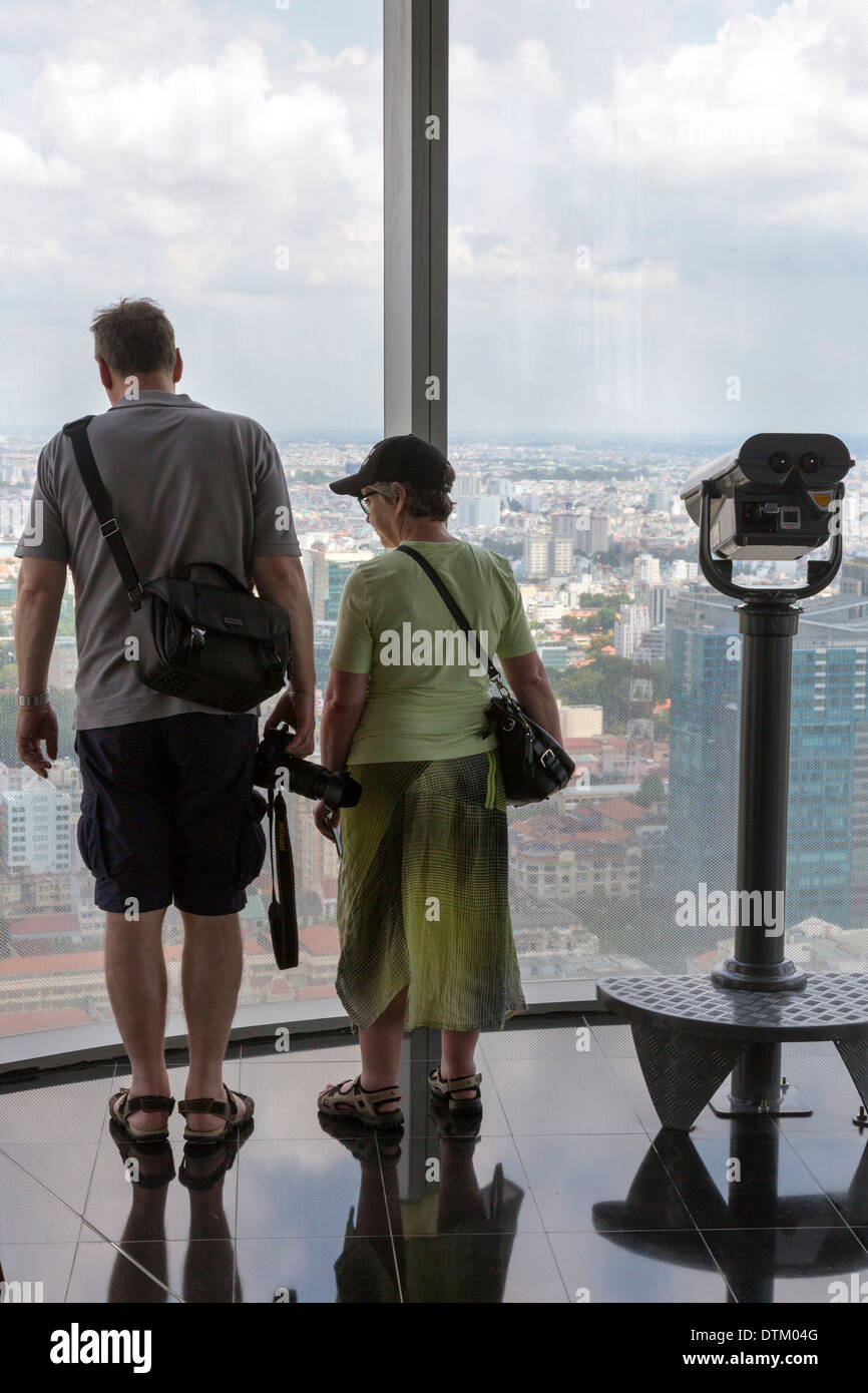 Tourists at Bitexco Tower viewing platform, Ho Chi Minh City, Vietnam Stock Photo