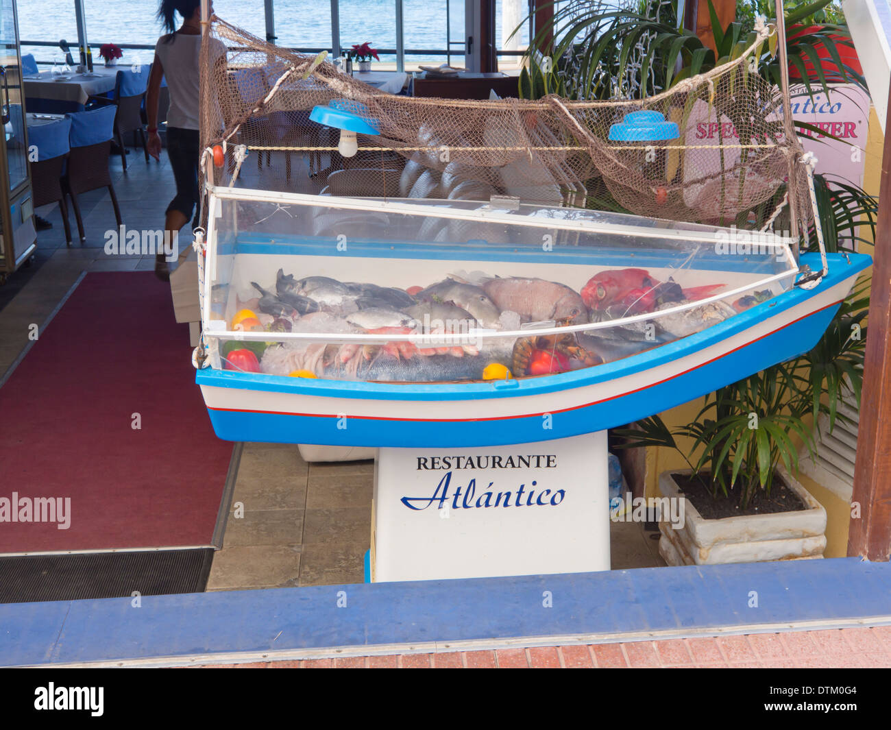 Indstilling Interconnect Lang Entrance to restaurant in Playa de Las Americas Tenerife Canary Islands  Spain, fresh fish on display in mock boat Stock Photo - Alamy