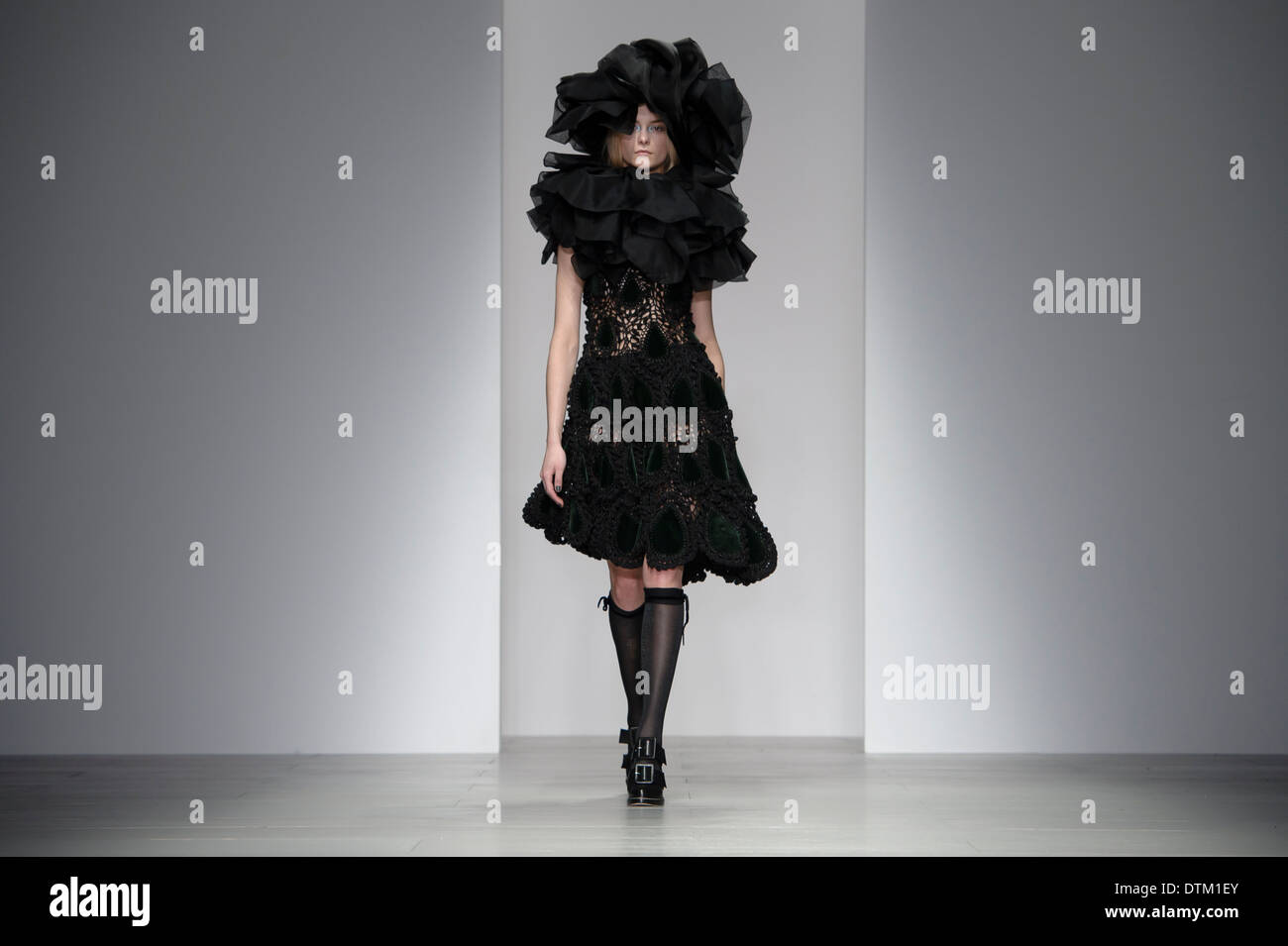 A model wears a design created by John Rocha during London Fashion Week Autumn/Winter 2014, at Somerset House. Stock Photo