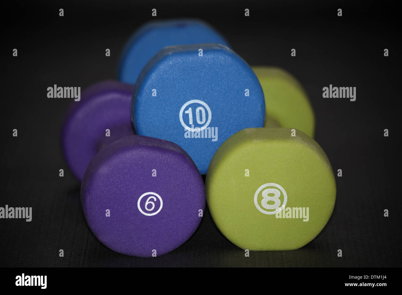 set of three dumbbells