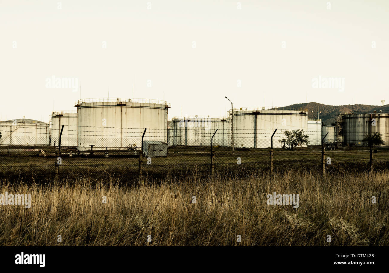 Huge old rusty fuel tanks Stock Photo Alamy