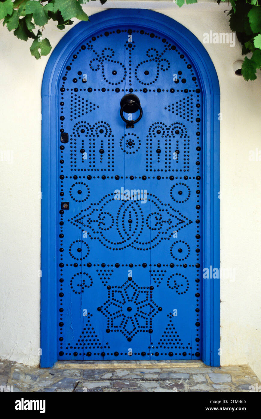 Tunisia, Sidi Bou Said. Blue Decorated Door to Private Home. Stock Photo