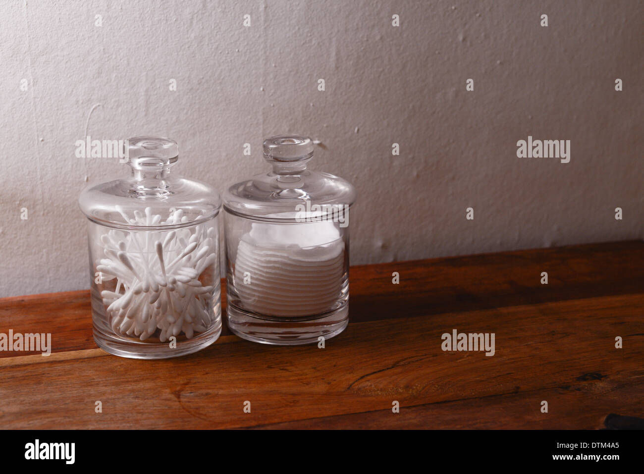 Two glass jars with cotton wool products Stock Photo Alamy