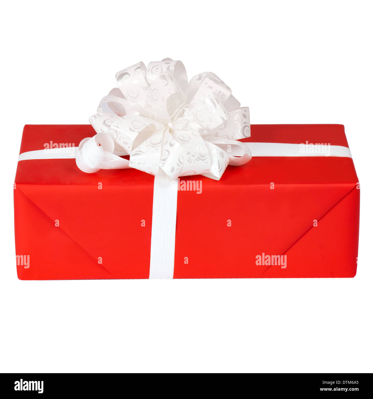 Single red gift box with silver ribbon on white background Stock Photo ...