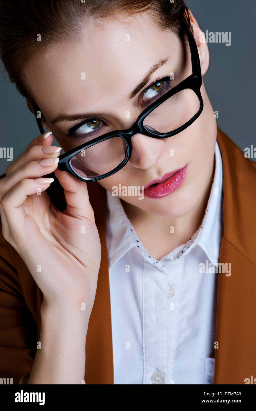Beautiful business woman with glasses. Closeup portrait Stock Photo
