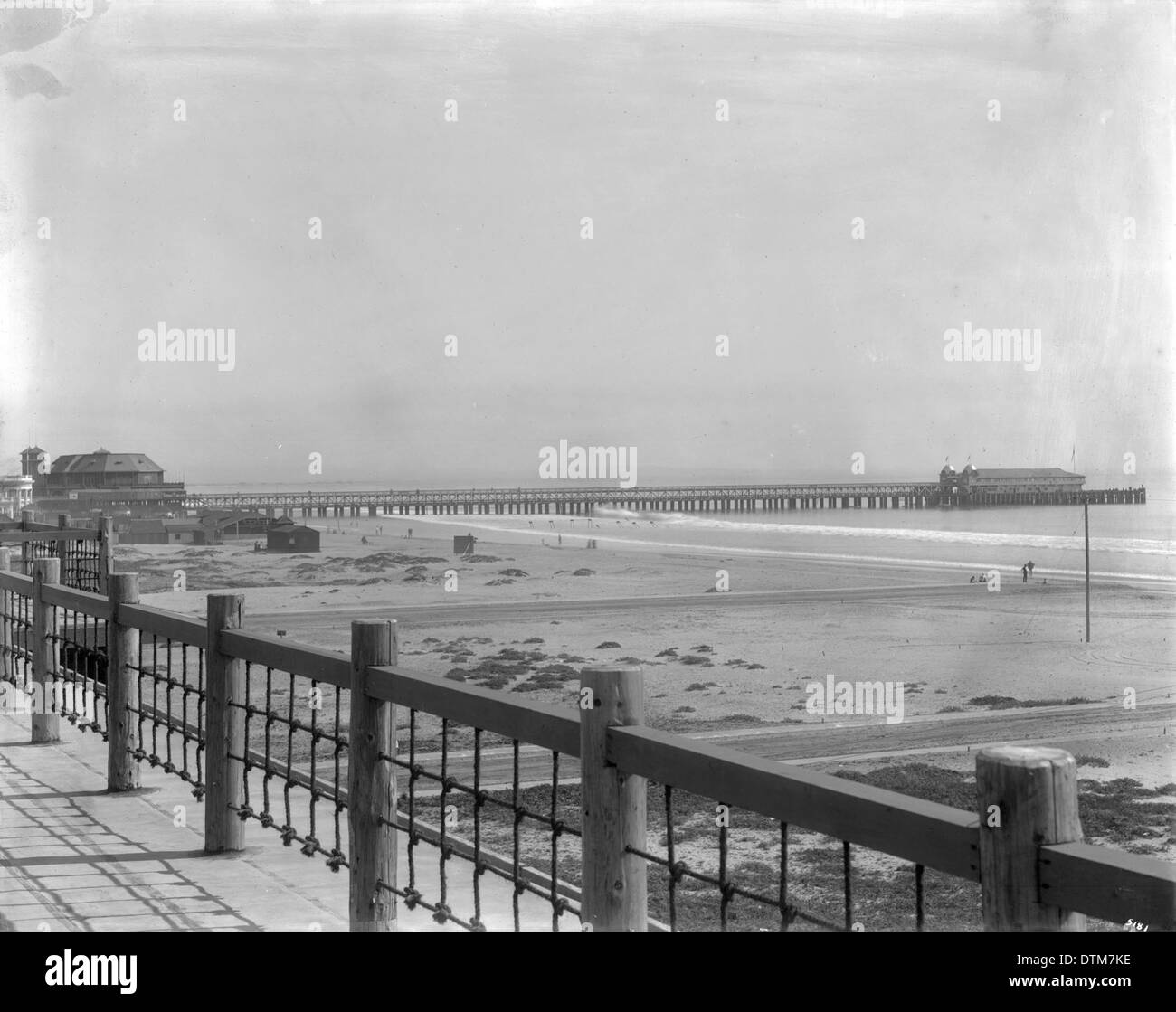 A view of Long Beach Pier and Pavilion taken from the promenade on the north end near the 'Ebel Club House,' around 1905-1910, showing the popular seaside destination during this period. Stock Photo