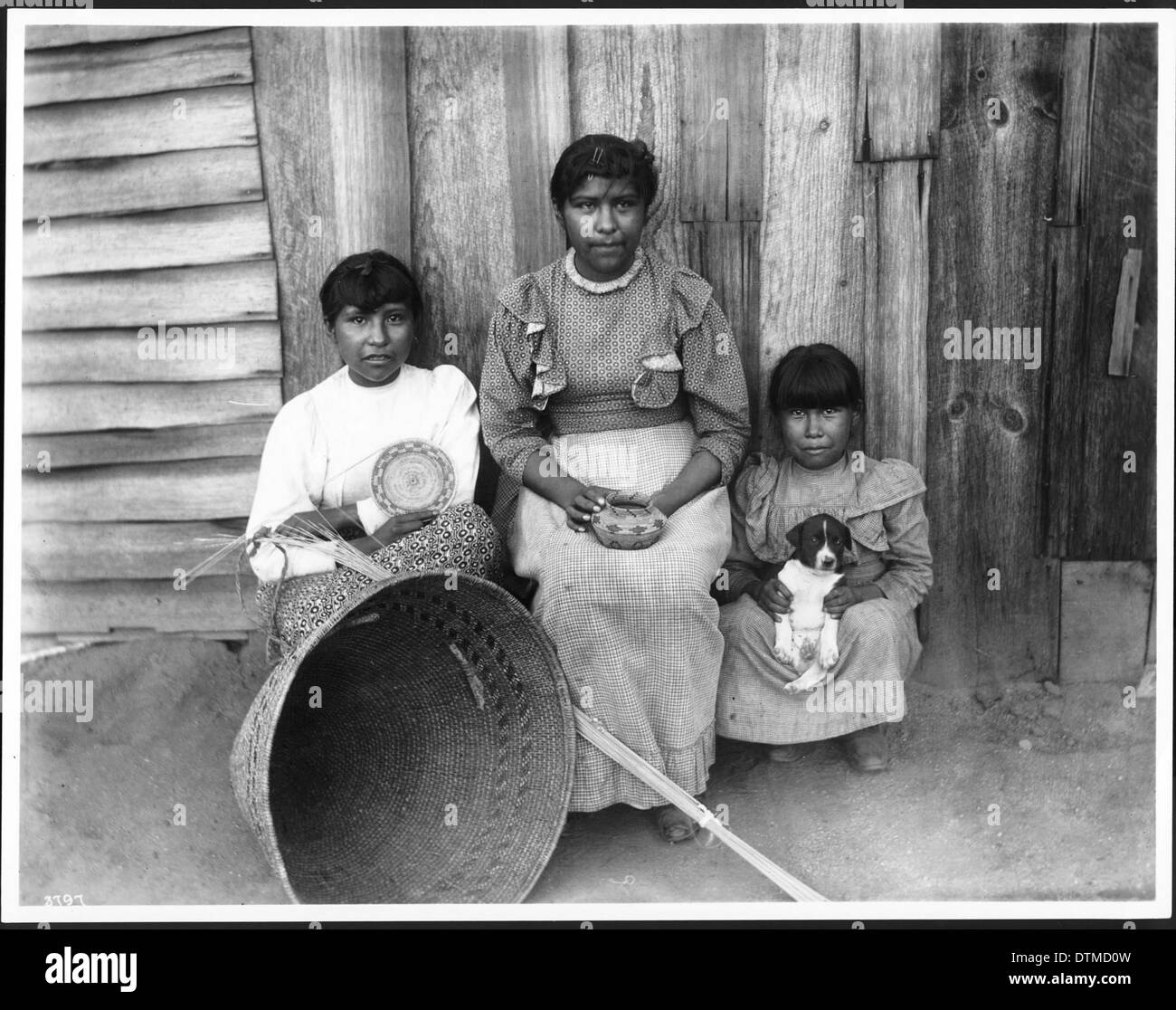 Yokut Indian women basket maker and two children, Tule River
