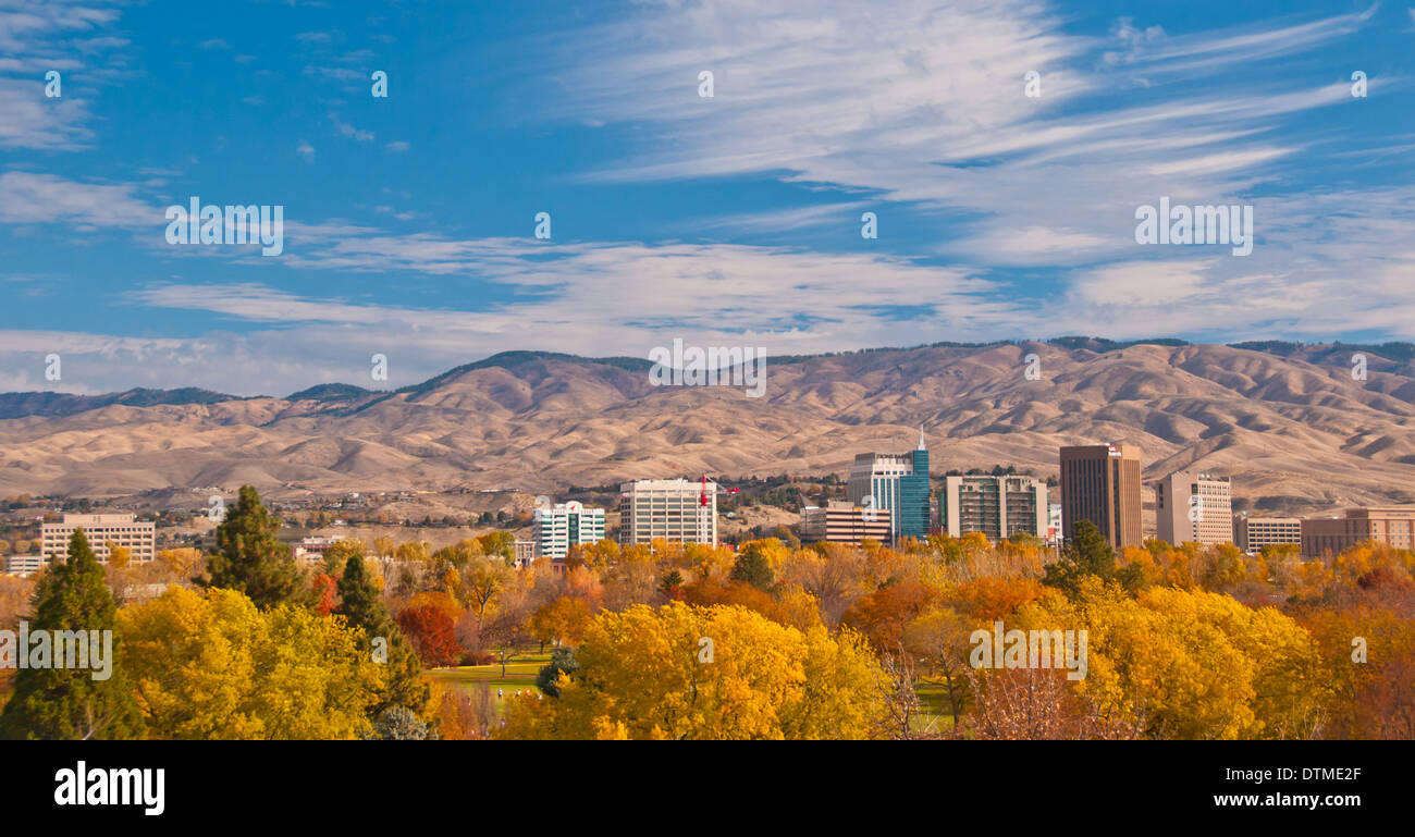 City of Boise Skyline in fall colors with Ann Morrison Park in the Foreground and Mountains Beyond. Boise, Idaho, USA Stock Photo