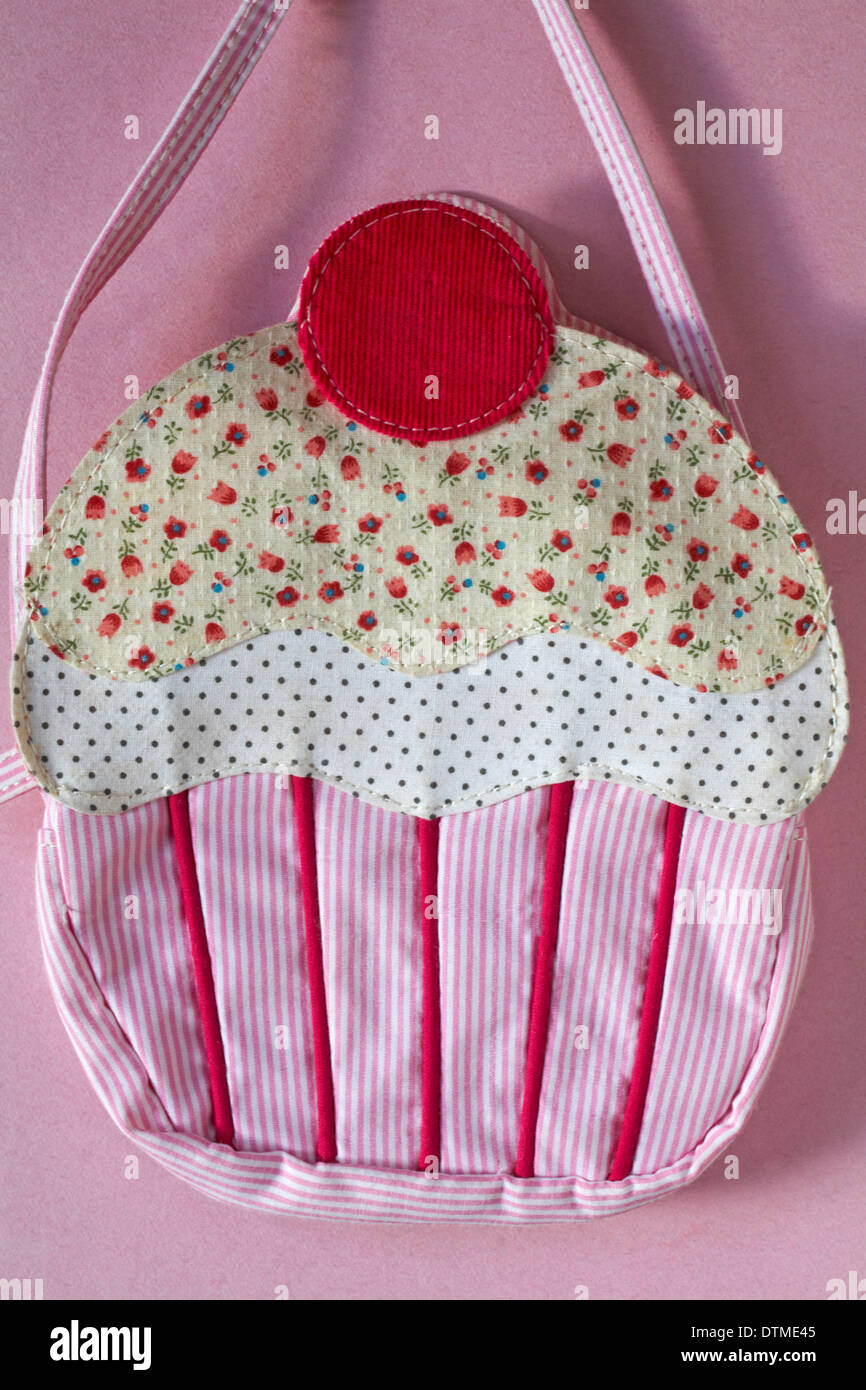 cupcake bag set on pink background Stock Photo