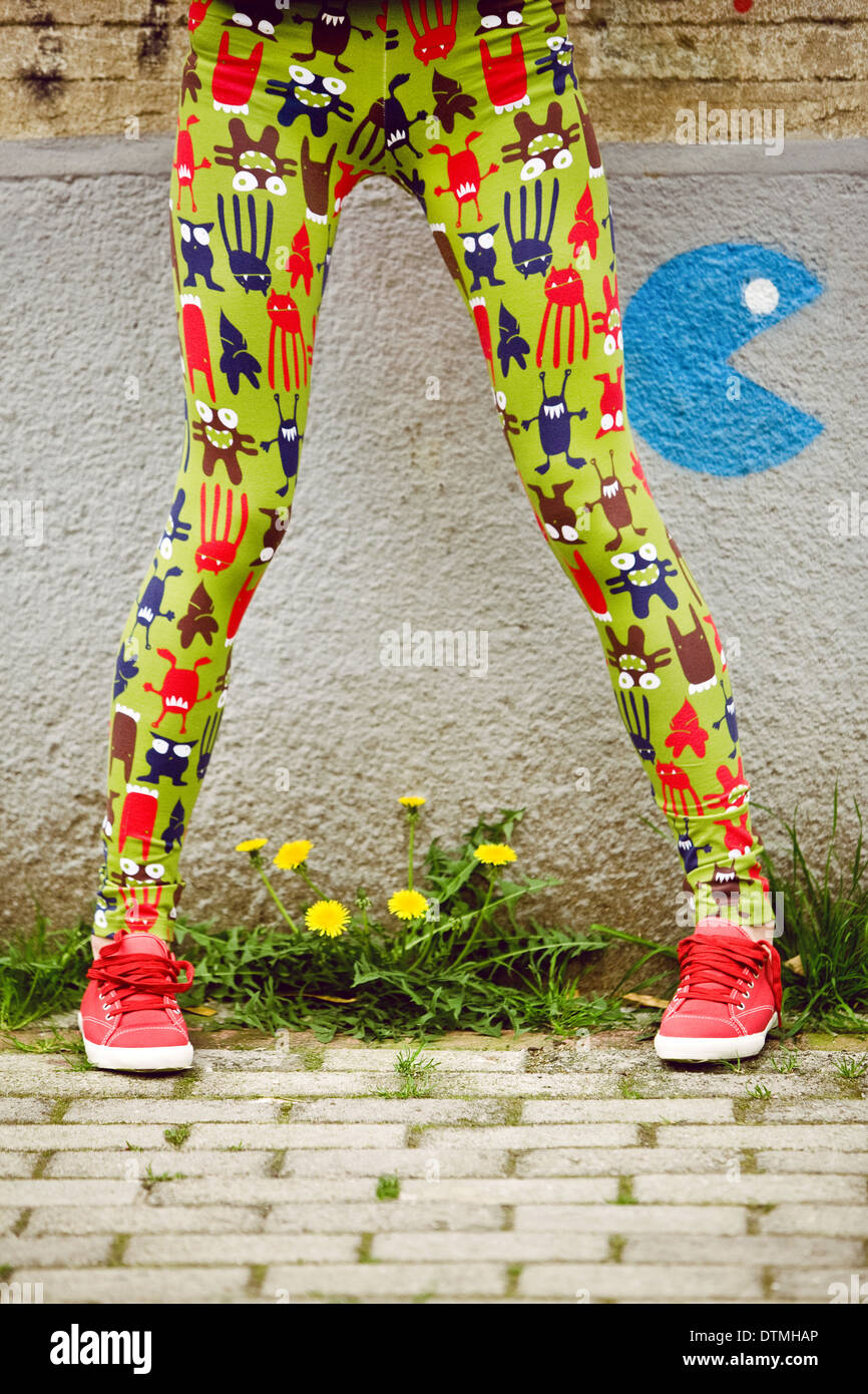Young girls legs wearing funny tights Stock Photo - Alamy