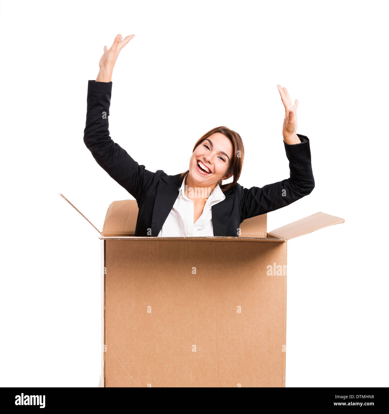 Happy business woman appear inside a big card box, isolated over white ...